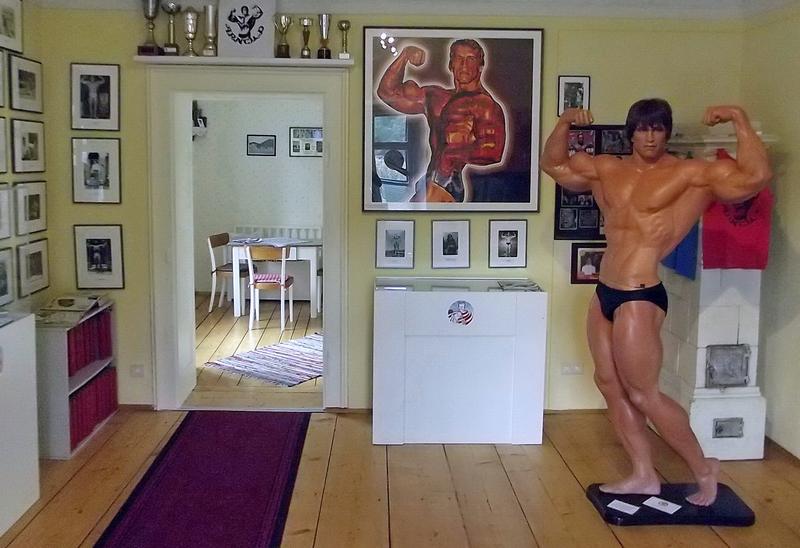 Living Room with Muscle Man at Arnold Schwarzenegger Geburtshaus Museum