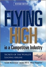 'Flying High in a Competitive Industry: Secrets of the World's Leading Airline' by Loizos Heracleous, Jochen Wirtz, Nitin Pangarkar (ISBN 0071281967)